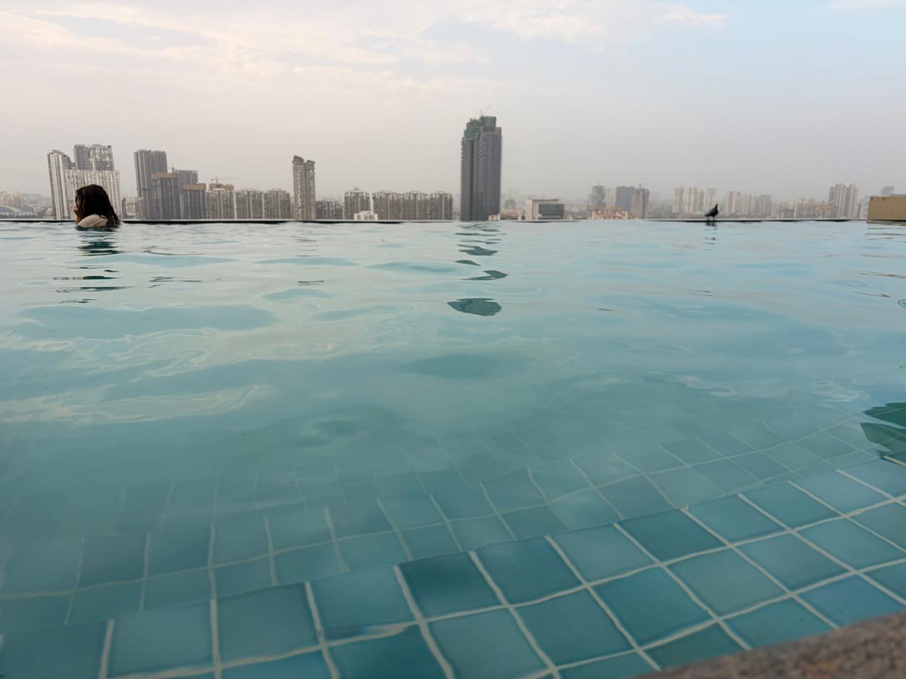An infinity pool that forgets it's in Gurgaon